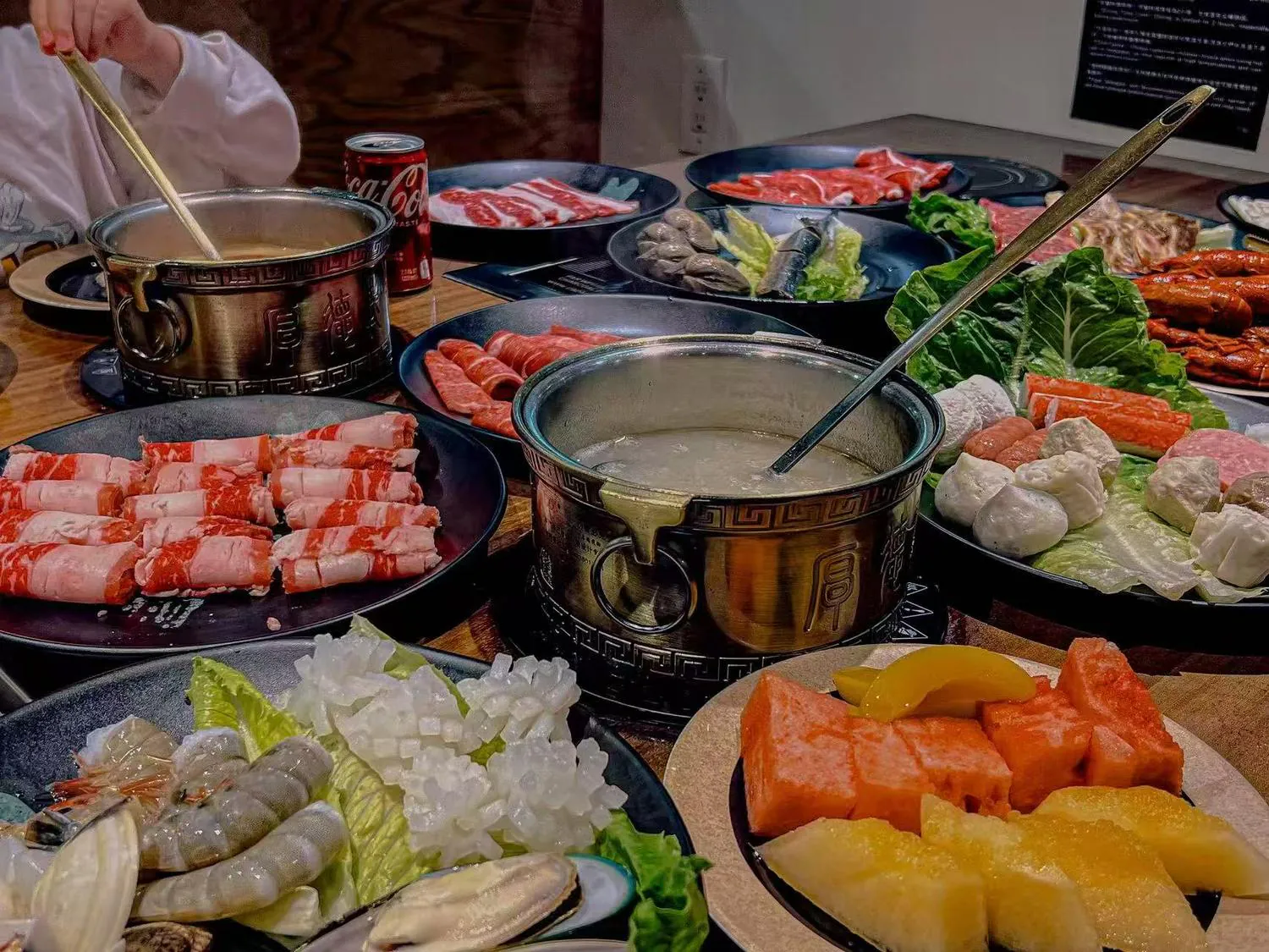 Spread of hot pot meats, seafood, vegetables and fruits at Lucky 199, a Asian Fusion Restaurant in Staten Island