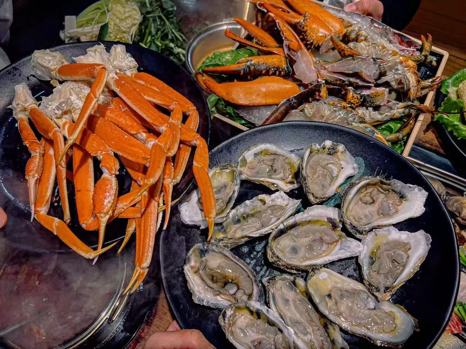 Platter of crab legs and fresh oysters at Lucky 199, a Asian Fusion Restaurant in Staten Island