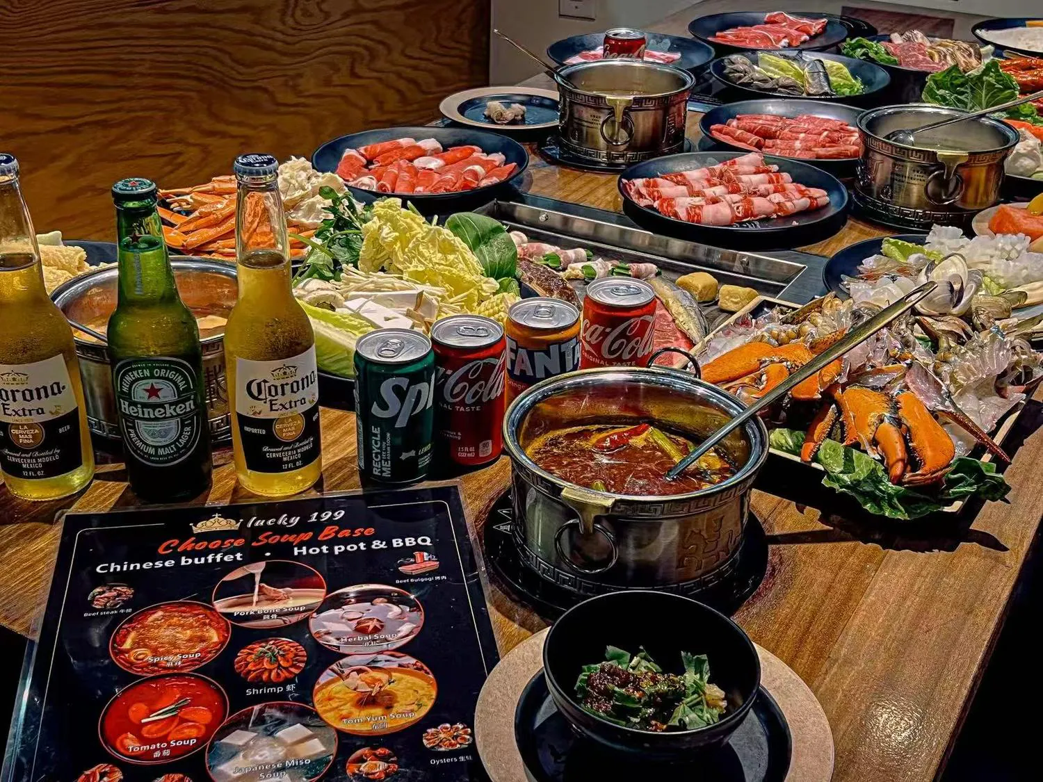 Buffet spread with hot pot, BBQ items and beverages at Lucky 199, a Asian Fusion Restaurant in Staten Island